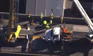 Trash truck crashes through Conowingo Dam Jersey wall falling 80 feet ...