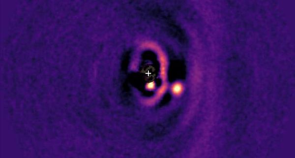 Astronomers capture first images of a baby planet growing in a ring of darkness