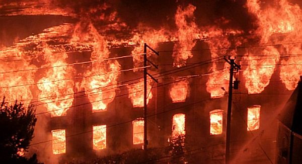 Massive six-alarm fire tears through Allentown industrial building, damaging homes, forcing evacuations